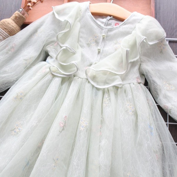 Moderna dječja haljina s gumbima, tilom i cvjetnim motivima