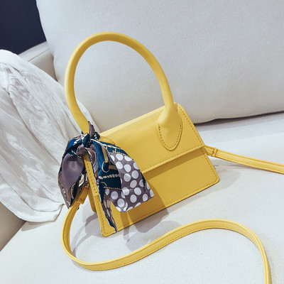 Modern női táska eko bőrből, színes szalaggal