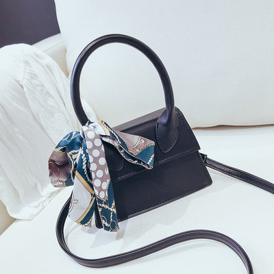 Modern női táska eko bőrből, színes szalaggal