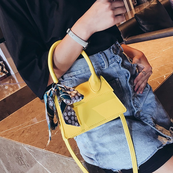 Modern női táska eko bőrből, színes szalaggal