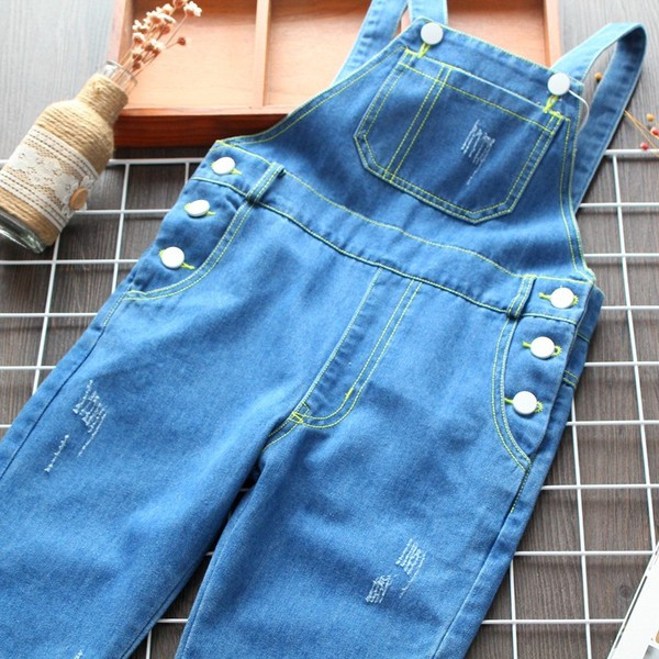 Tüdrukute rebenenud motiividega laste teksakombinesoonide uus mudel