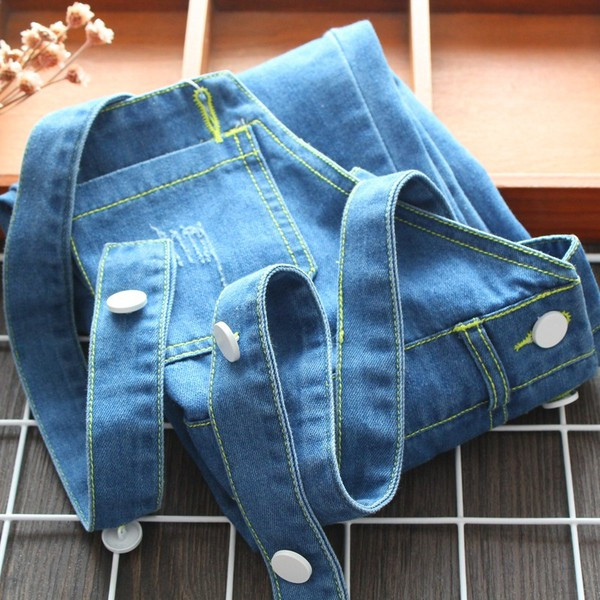 Tüdrukute rebenenud motiividega laste teksakombinesoonide uus mudel