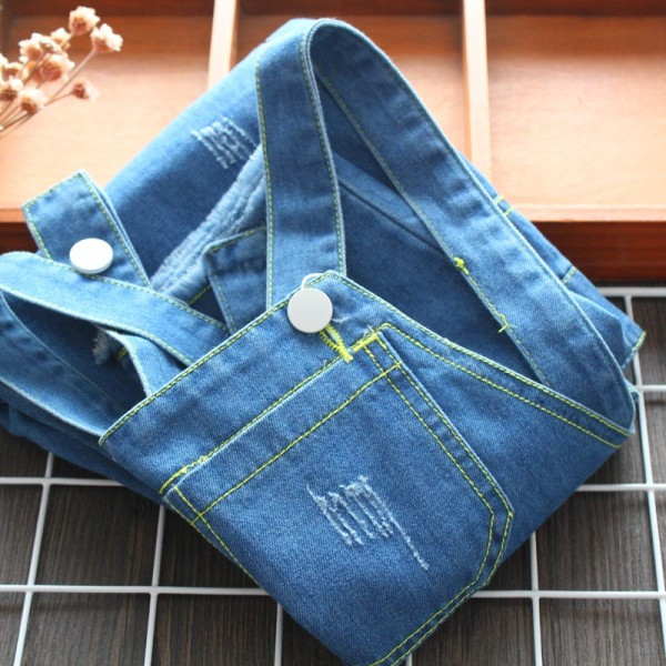 Tüdrukute rebenenud motiividega laste teksakombinesoonide uus mudel