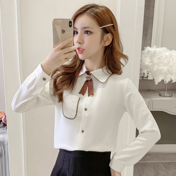 Női alkalmi ing brosssal és zsebbel