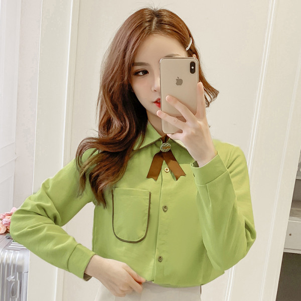 Női alkalmi ing brosssal és zsebbel