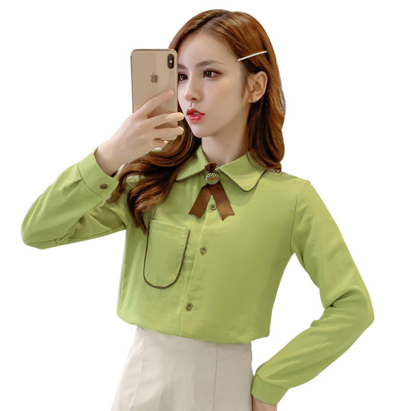 Női alkalmi ing brosssal és zsebbel