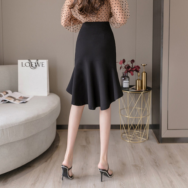 Női alkalmi szoknya magas derékkal és gombokkal-aszimmetrikus modell