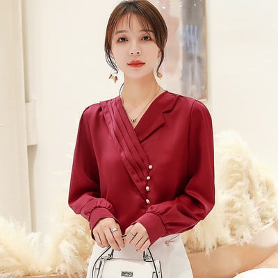 Elegantna ženska košulja sa špic izrezom i dugim rukavima