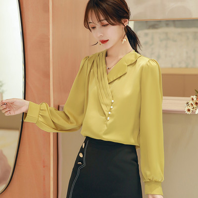 Elegantna ženska košulja sa špic izrezom i dugim rukavima