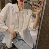 Balts sieviešu krekls ar klasisku apkakli un garām piedurknēm