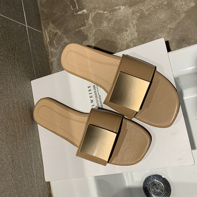 Női alkalmi bőr papucs lapos talppal és csattal