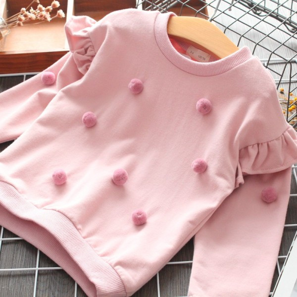 Ikdienas bērnu blūze ar pomponiem un ovālu kakla izgriezumu meitenēm