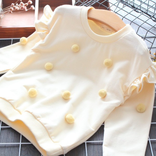 Ikdienas bērnu blūze ar pomponiem un ovālu kakla izgriezumu meitenēm