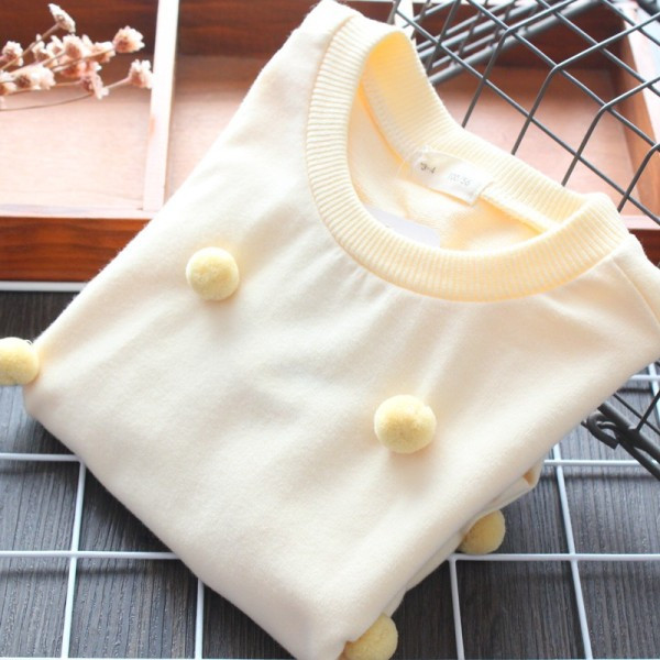 Ikdienas bērnu blūze ar pomponiem un ovālu kakla izgriezumu meitenēm