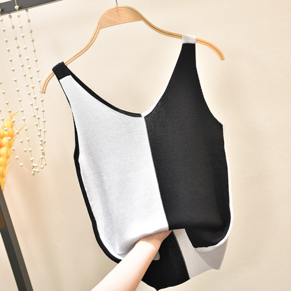 Divu toņu sieviešu topiņš no plānas adījuma ar platām lencēm