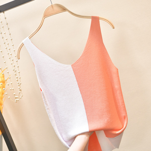 Divu toņu sieviešu topiņš no plānas adījuma ar platām lencēm