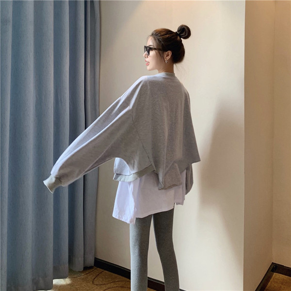 Hosszú női blúz ovális nyakkivágással - széles modell