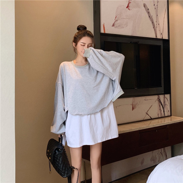 Hosszú női blúz ovális nyakkivágással - széles modell