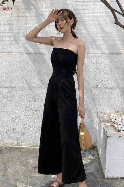 Moderns sieviešu kombinezons ar kabatām melnā krāsā