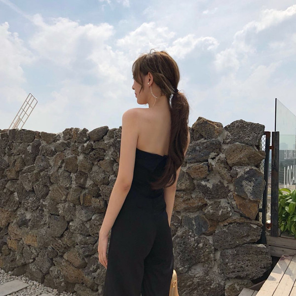 Moderns sieviešu kombinezons ar kabatām melnā krāsā