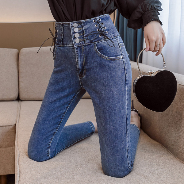 Mūsdienīgi sieviešu pieguloši džinsi ar augstu vidukli