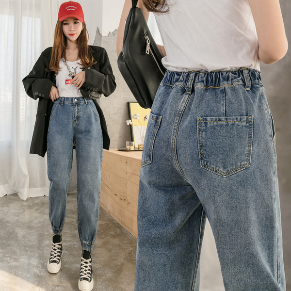 Modernūs moteriški džinsai elastingu juosmeniu