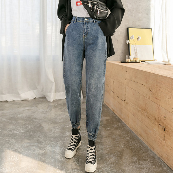 Modernūs moteriški džinsai elastingu juosmeniu