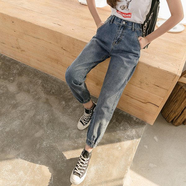 Modernūs moteriški džinsai elastingu juosmeniu