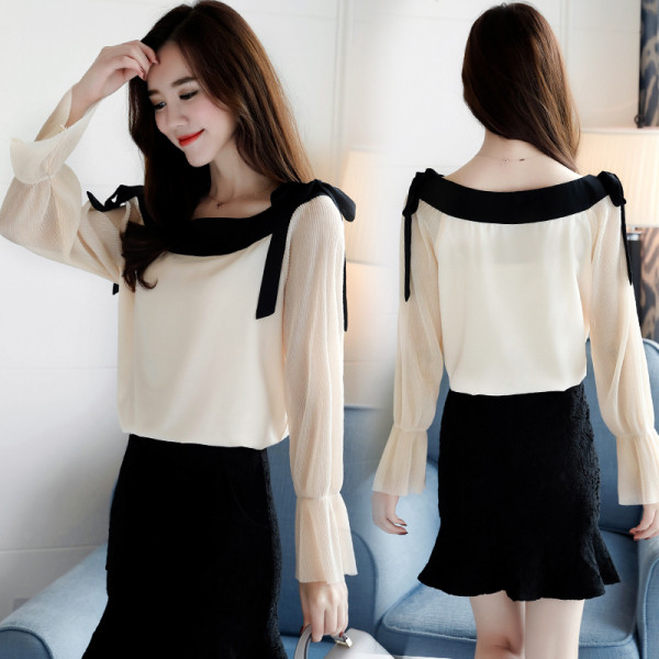 Elegáns női ing szalagokkal