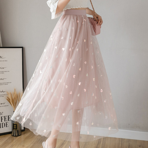 Novi model suknje ženskog kroja sa visokim strukom i šljokicama