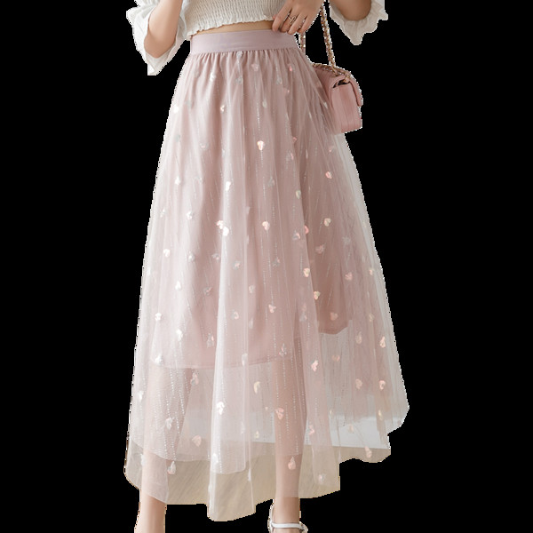 Novi model suknje ženskog kroja sa visokim strukom i šljokicama