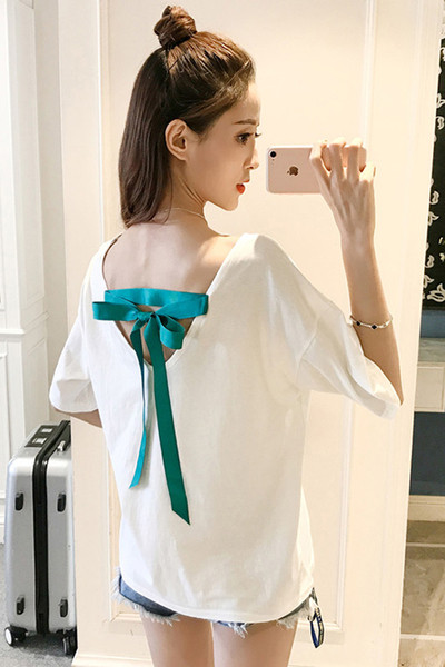 Vabaaja naiste t-särk, millel on prindi ja lipsud seljal