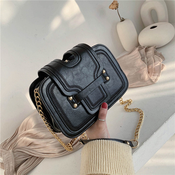 Moderna sieviešu maza soma no eko ādas ar garu rokturi