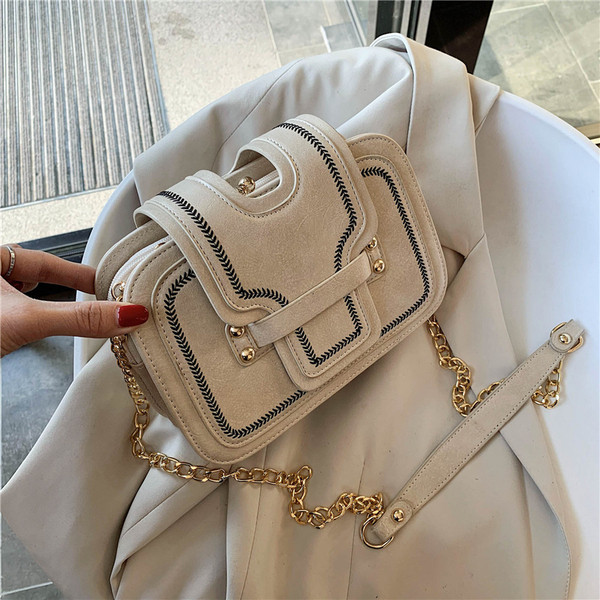 Moderna sieviešu maza soma no eko ādas ar garu rokturi