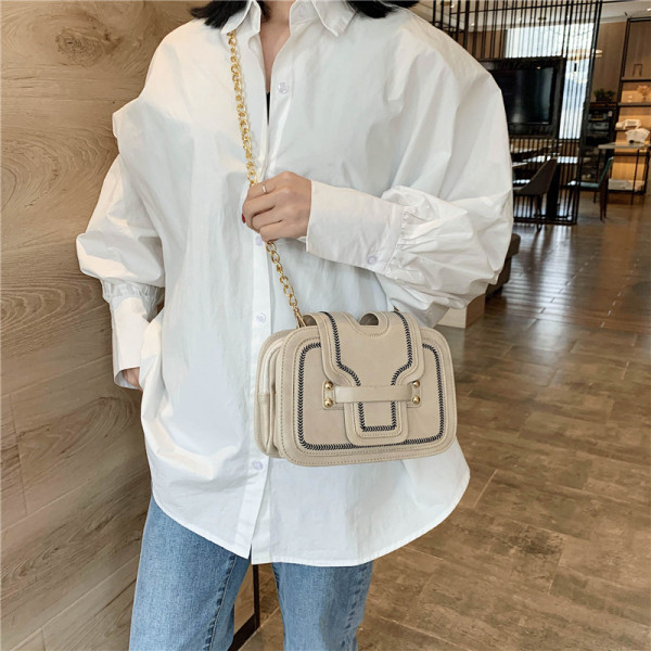 Moderna sieviešu maza soma no eko ādas ar garu rokturi