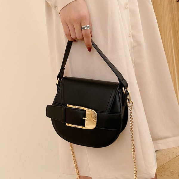 Ženska torba od eko kože sa metalnom kopčom, dugom i kratkom ručkom