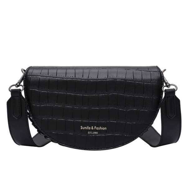 Sieviešu ādas soma ar platu siksnu un reljefu pārvalku