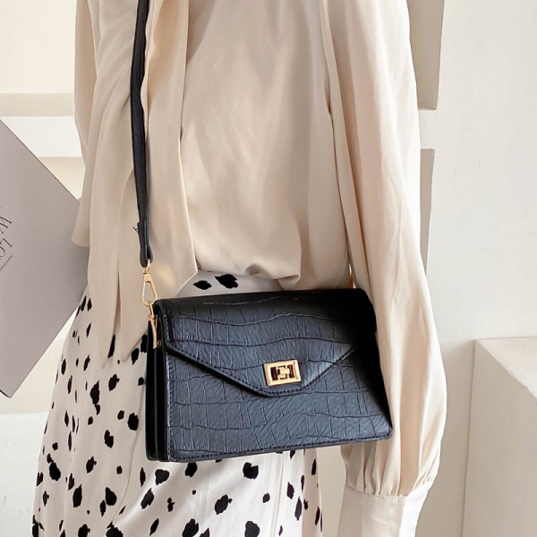 Stiilne naiste kott reljeefse katte, metallist luku ja pika sangaga