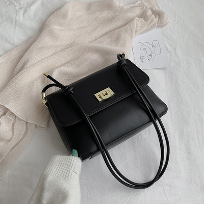 Moteriška grynos odos rankinė su dviguba rankena