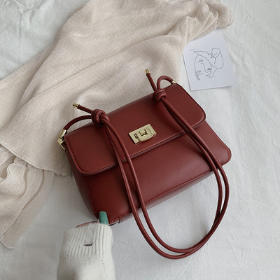 Moteriška grynos odos rankinė su dviguba rankena