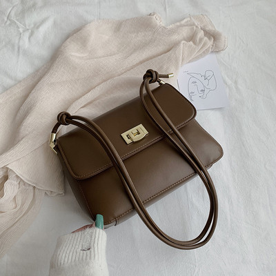 Moteriška grynos odos rankinė su dviguba rankena