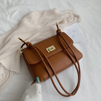 Moteriška grynos odos rankinė su dviguba rankena