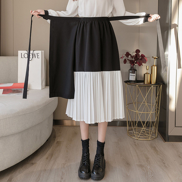 Retro stila sieviešu svārki ar pogām un saitēm