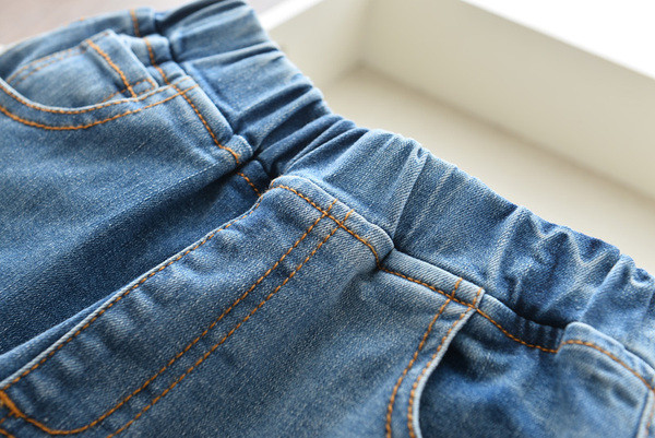 Mūsdienīgi gari bērnu džinsi ar izšuvumu meitenēm