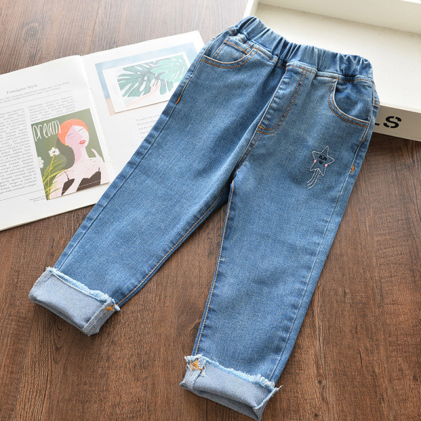 Mūsdienīgi gari bērnu džinsi ar izšuvumu meitenēm