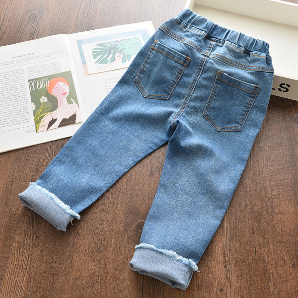 Mūsdienīgi gari bērnu džinsi ar izšuvumu meitenēm