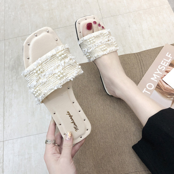 Moteriškos šlepetės plokščiu padu ir perlų elementu