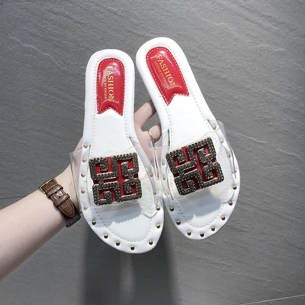 Ženske papuče s ravnim potplatom i metalnom kopčom