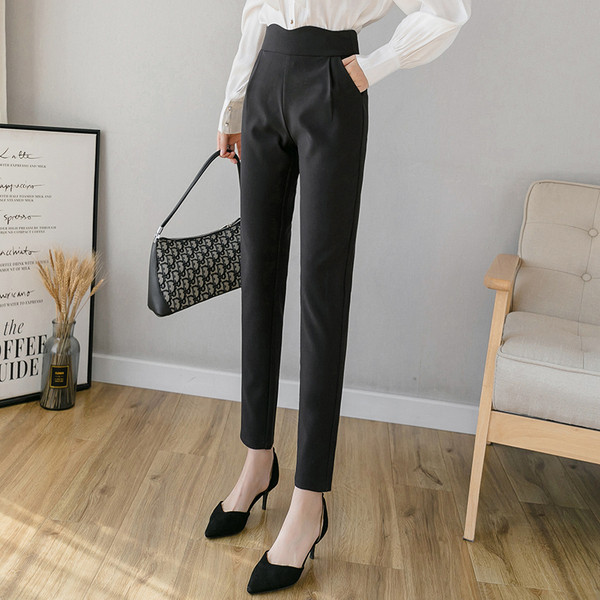 Klasiskas melnas sieviešu bikses ar augstu vidukli un kabatām