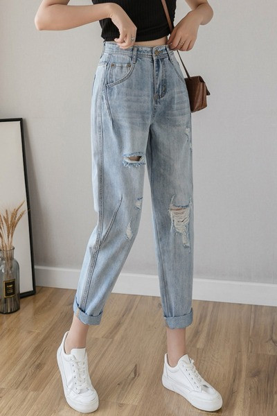 Ikdienas sieviešu džinsi ar augstu vidukli un plēstiem motīviem - plats modelis